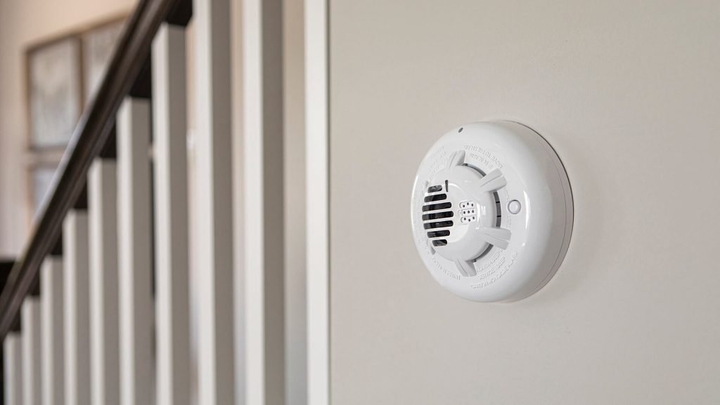 CPI Security carbon monoxide mounted next to staircase