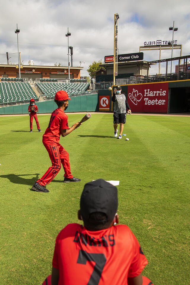 20210818tb_9000_eml kids learning skills from the Charlotte Knights players