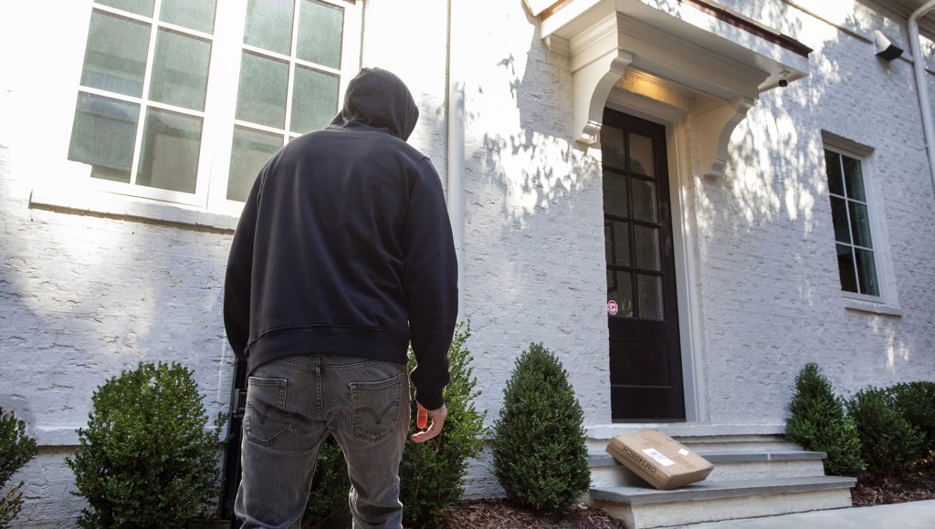 Package Thief approaching front door