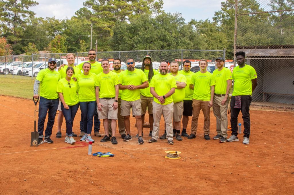 CPI Security Employees refurbish Youth Baseball Fields