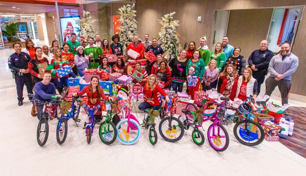 CPI Security Employees donate presents to annual toy drive