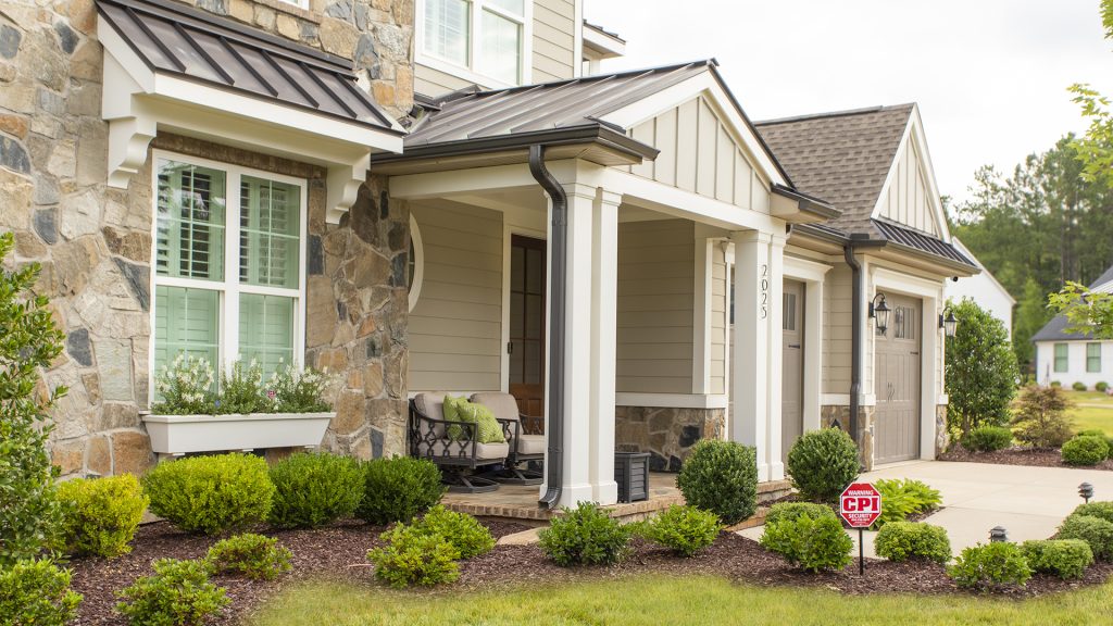 CPI Security yard sign in front of house