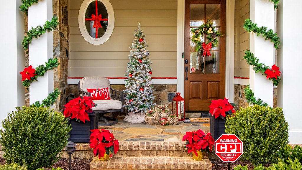 Front door of house decorated in Christmas decorations