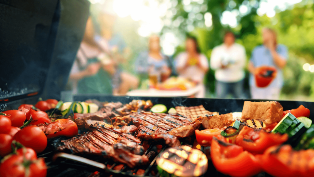 Food on grill with people in background