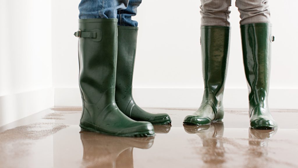 Rain boots in house filled with water