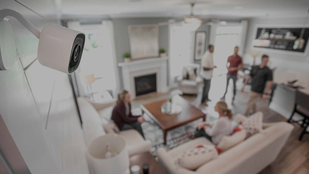 CPI Security indoor camera mounted on living room wall