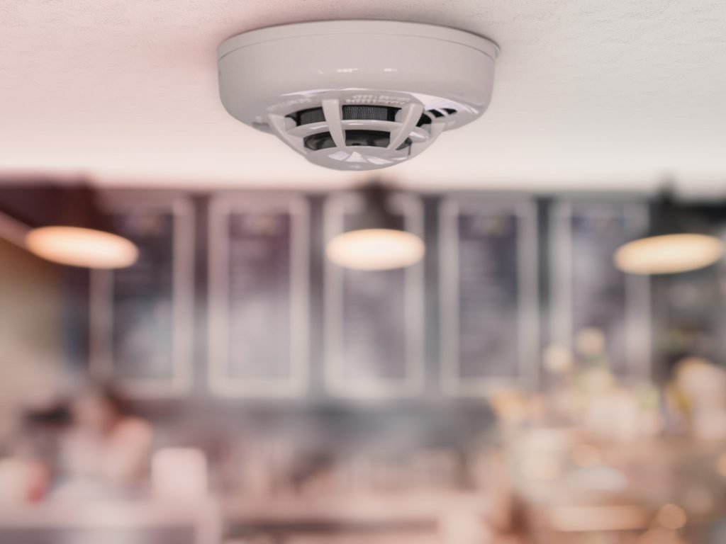 CPI Security heat detector mounted on business ceiling