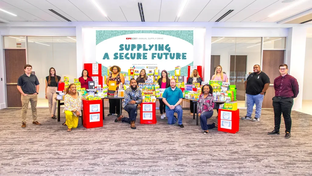 CPI Security employees donate school supplies