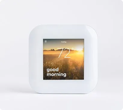 Smart thermostat displaying 72° and a good morning message