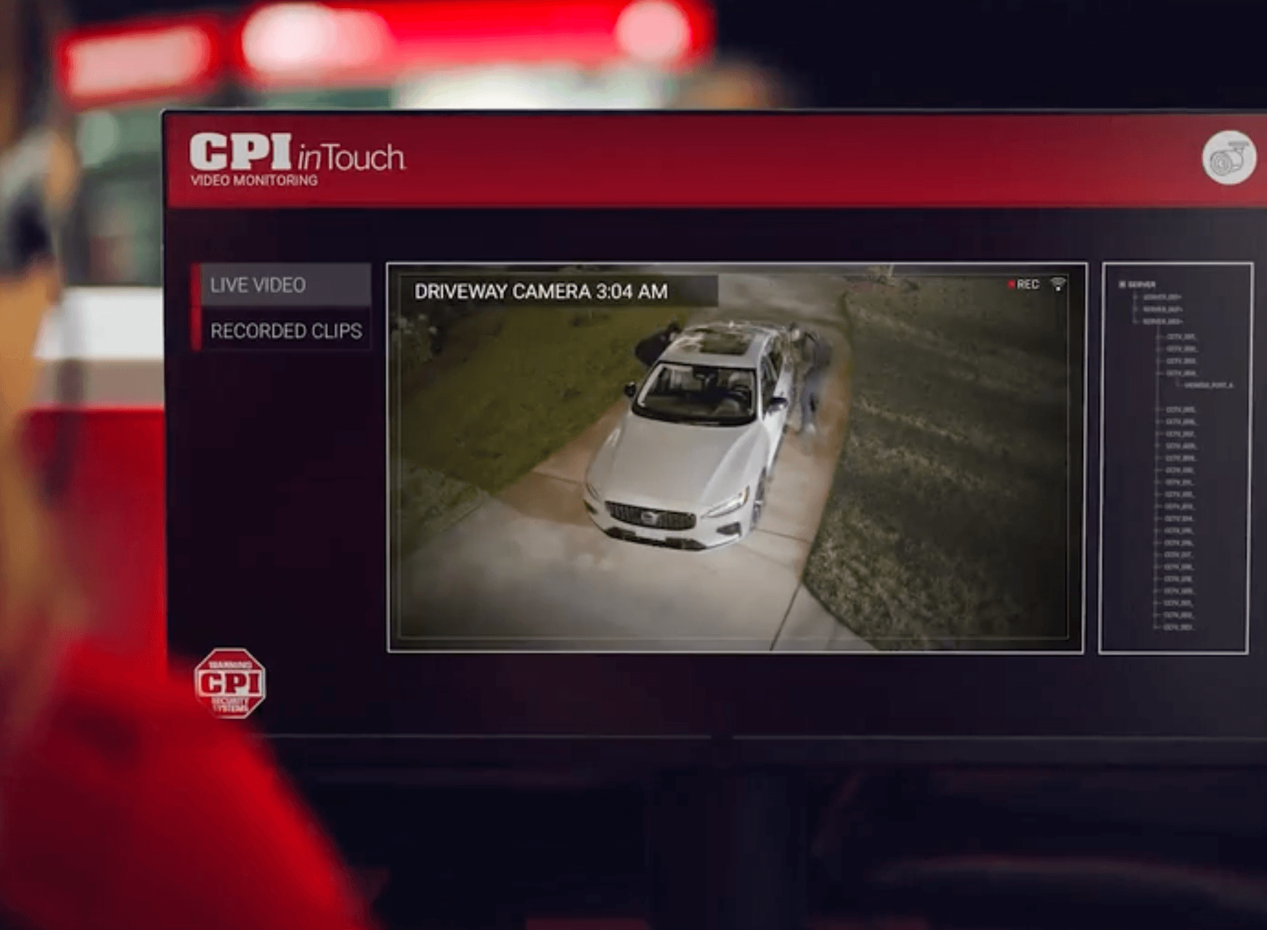 Security Monitor showing driveway security footage of home